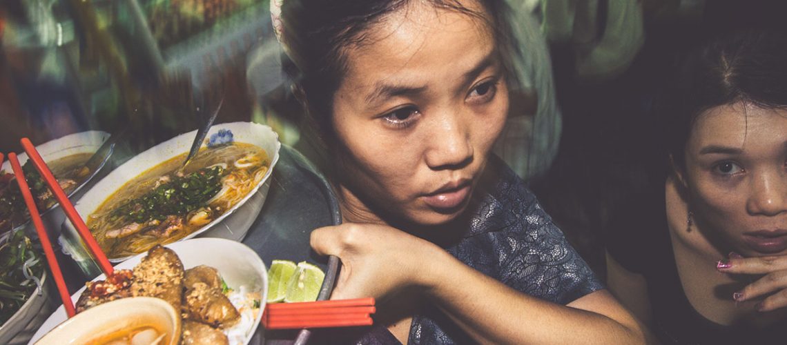 Professional photographer Vietnamese woman delivers great food