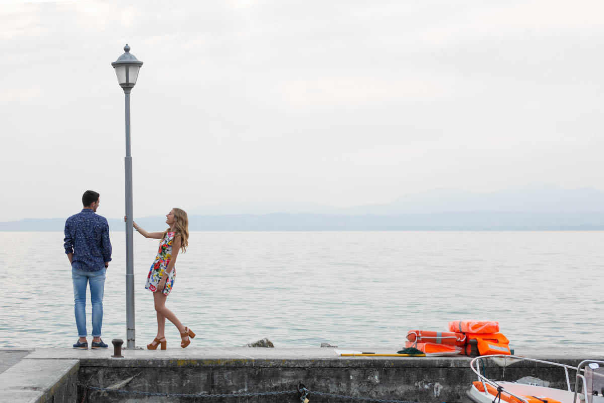 Professional wedding photographer. Engagement photo shoot in Lazise, Lake Garda, Verona