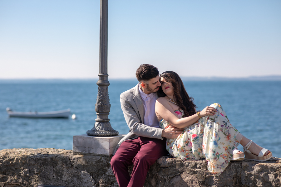 Professional wedding photographer. Couple in love on the shores of Lake Garda