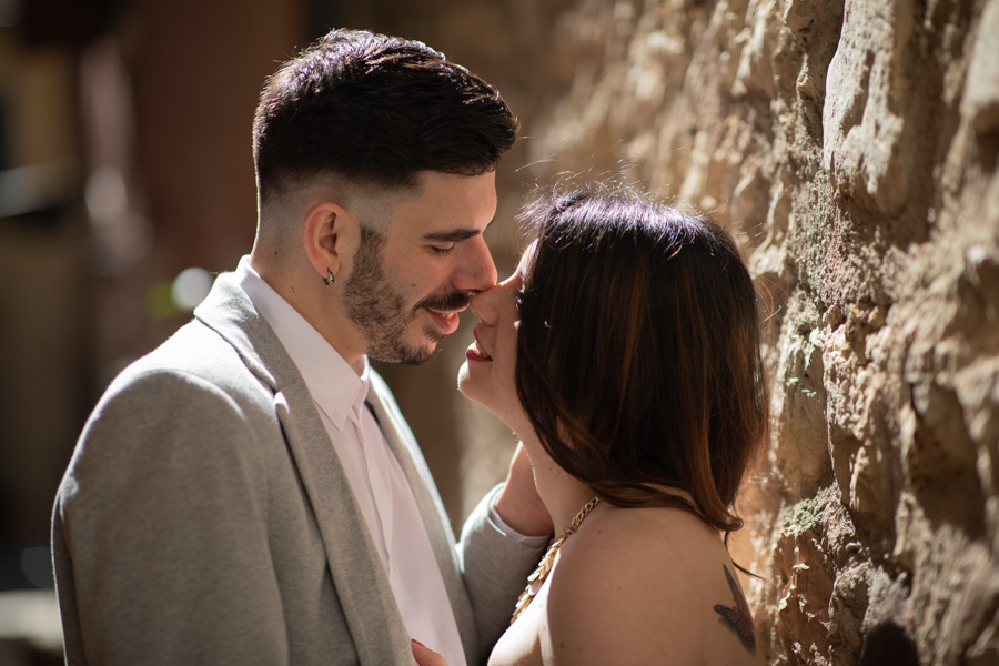 Couple of lovers in the narrow streets of Torri Del Benaco, Lake Garda